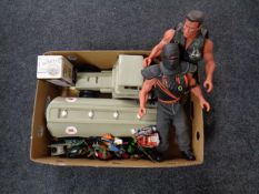 A box containing plastic Mobil truck with trailer, die cast vehicles,