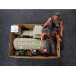 A box containing plastic Mobil truck with trailer, die cast vehicles,