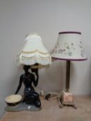 A brass and marble Corinthian column table lamp on paw feet with shade,