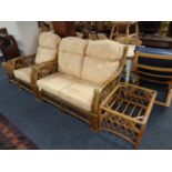 A bamboo and wicker two piece conservatory suite with matching coffee table (no glass)