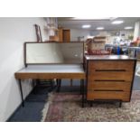 A mid 20th century stag furniture three drawer dressing table with storage mirror together with a