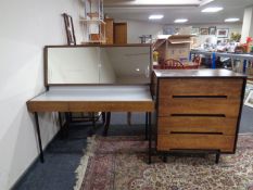 A mid 20th century stag furniture three drawer dressing table with storage mirror together with a