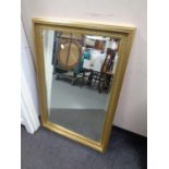 A gilt framed bevel edged mirror