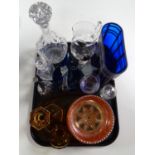 A tray of petrol glass bowl, decanter, amber glass dressing table pieces,