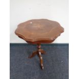 A shaped Italian style occasional table