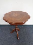 A shaped Italian style occasional table