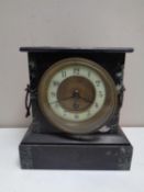 A 19th century marble and black slate mantel clock with brass and enamel dial