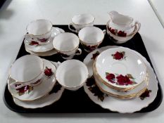 A tray containing a twenty one piece Royal Vale bone china tea service