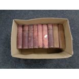 A box containing nine volumes,