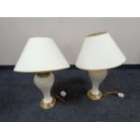 A pair of ceramic and brass table lamps with shades