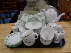 A tray containing an eleven piece Queen Elizabeth Golden Jubilee tea service, Atlas china,