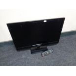 A Panasonic 24'' LCD TV with remote