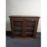 A 19th century oak double door bookcase top