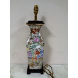 An oriental famille rose vase converted into a table lamp