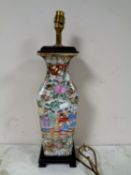 An oriental famille rose vase converted into a table lamp