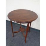 A late Victorian inlaid mahogany circular occasional table