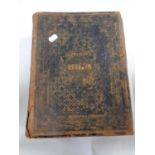 An antiquarian leather bound Brown's self interpreting family bible with colour book plates