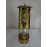 An E Thomas and Williams brass miner's lamp