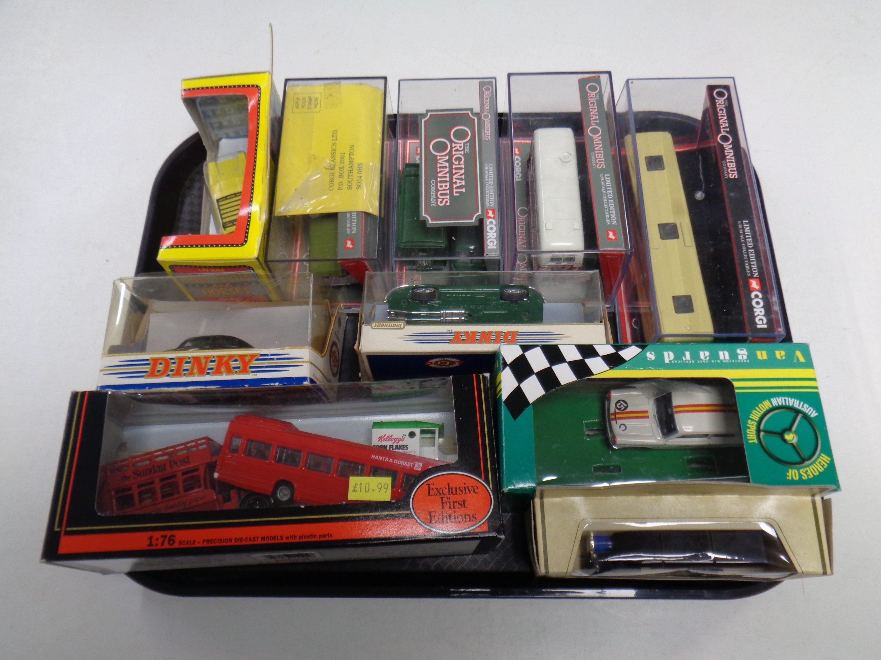 A tray containing boxed die cast vehicles to include Dinky, 1968 Jaguar and 1951 Volkswagen,