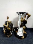 An Italian black and gilt pottery jardiniere stand with matching table lamp depicting storks