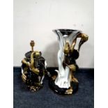 An Italian black and gilt pottery jardiniere stand with matching table lamp depicting storks