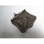 A 19th century cast metal belt mounted shot casket