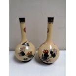 A pair of cloisonne bud vases,