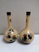 A pair of cloisonne bud vases,