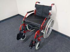 A folding lightweight wheelchair with cushion