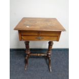 A Victorian walnut work table