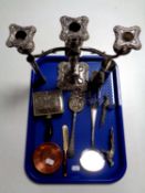 A tray containing a quantity of silver plate to include table candelabra,