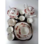 A tray containing a twenty-three piece Paragon Majestic china tea service together with four