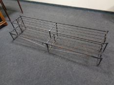 A cast iron two tier plant stand,