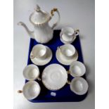 A tray containing a fifteen piece Royal Albert Val D' Or bone china tea service