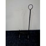 A cast iron boot scraper