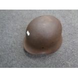 A German World War II tin helmet