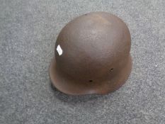 A German World War II tin helmet