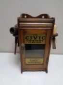 A Edwardian smoker's cabinet with pipes