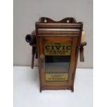 A Edwardian smoker's cabinet with pipes