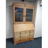 A 19th century oak leaded glass door bureau bookcase