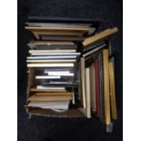 A box containing a large quantity of assorted picture frames, mirrored frames, prints,
