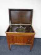 An early 20th century oak cased Colombia radiogram