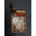 A box containing assorted glassware, wooden bellows, wooden storage jar,