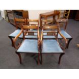 A set of six Reprodux brass inlaid chairs, two carvers,