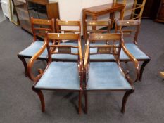 A set of six Reprodux brass inlaid chairs, two carvers,