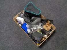 A box containing a large quantity of camera equipment to include cameras, tripods, lenses, a P. P.