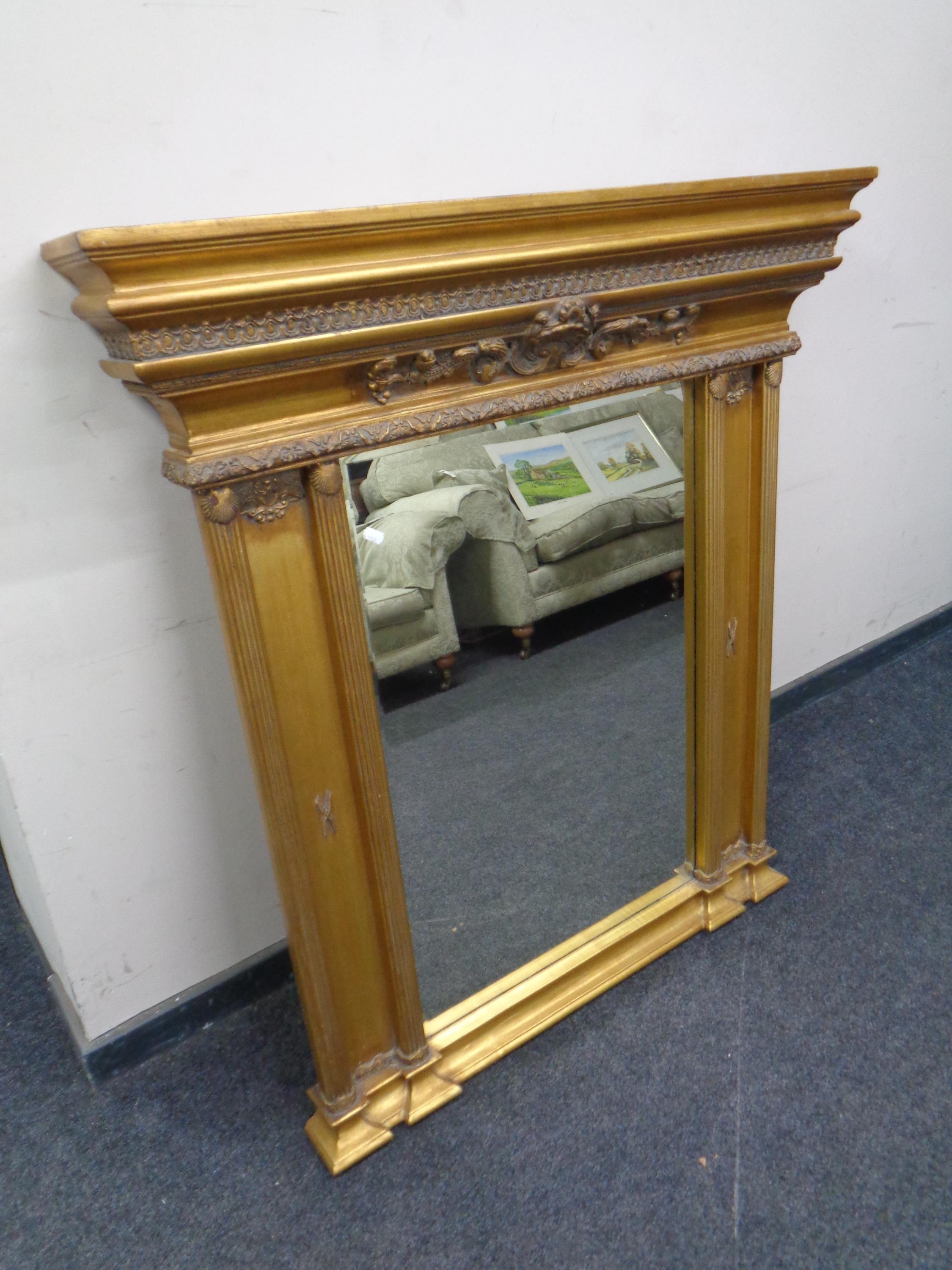 A Victorian style gilt framed bevel edged over mantel mirror,