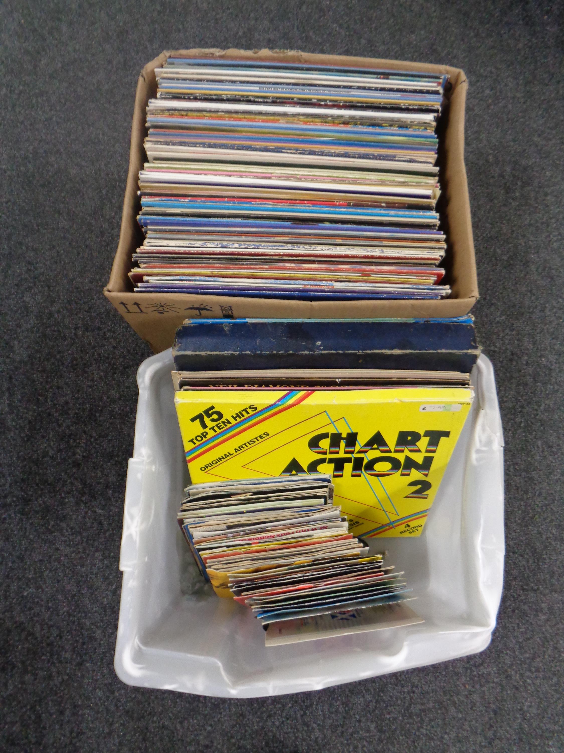 Two boxes containing a quantity of vinyl LPs and 7 inch singles, Genesis, Mike Oldfield,