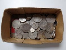 A box of assorted coins to include commemorative crowns, six pences,