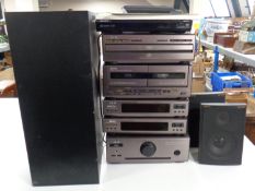 An Akai stereo system together with pair of Jamo speakers and sub woofer,